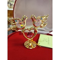 Divi balodīši uz sirsniņas